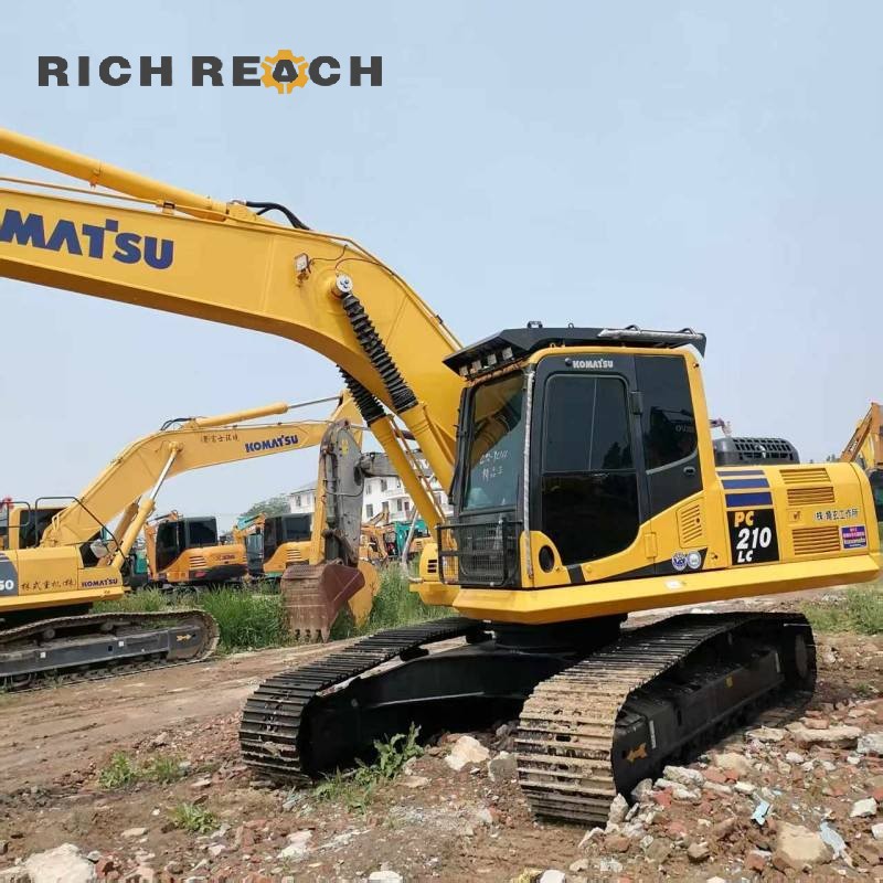 Boom cylinder and arm structure of a 2018 Komatsu PC210 excavator priced at $30,556
